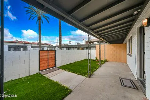 a view of a porch with a backyard