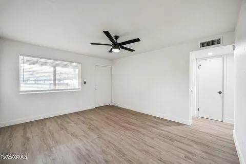 a view of a house with a street