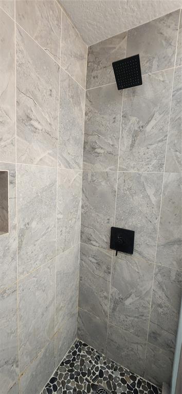 6839 Southwest 82 Terrace Gainesville, FL 32608 - Photo 11 of 28 a bathroom with a shower