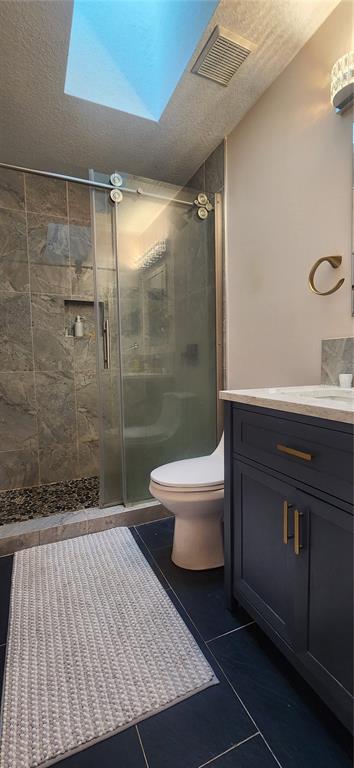 6839 Southwest 82 Terrace Gainesville, FL 32608 - Photo 12 of 28 a bathroom with a sink toilet and shower