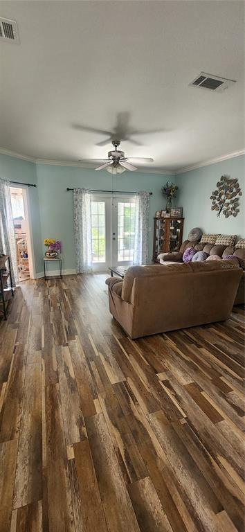6839 Southwest 82 Terrace Gainesville, FL 32608 - Photo 14 of 28 a bedroom with a large bed and a large window