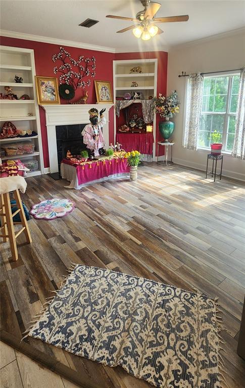6839 Southwest 82 Terrace Gainesville, FL 32608 - Photo 17 of 28 a living room with furniture and a fireplace