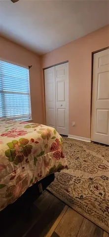 a bedroom with a bed