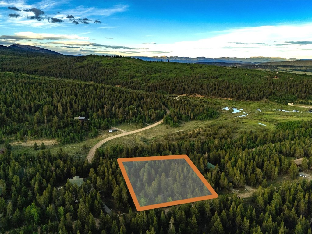 250 Skidoo Road Fairplay, CO 80440 - Photo 7 of 42 a view of a lake and a yard