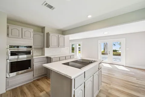 a view of a house with a swimming pool