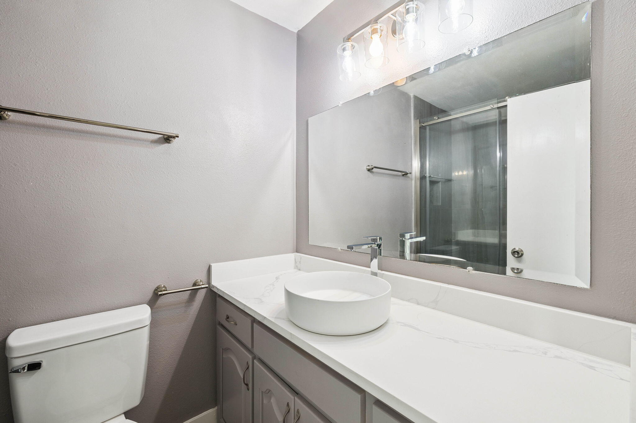 2208 Bay Grove Road Freeport, FL 32439 - Photo 44 of 70 a bathroom with a sink and a mirror