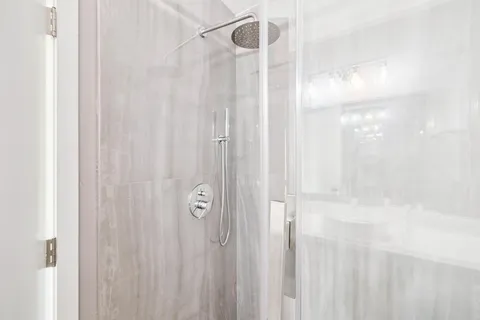 a view of a swimming pool with a yard