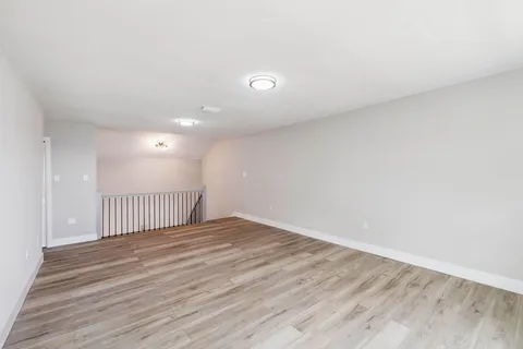 a view of a lake with a garden