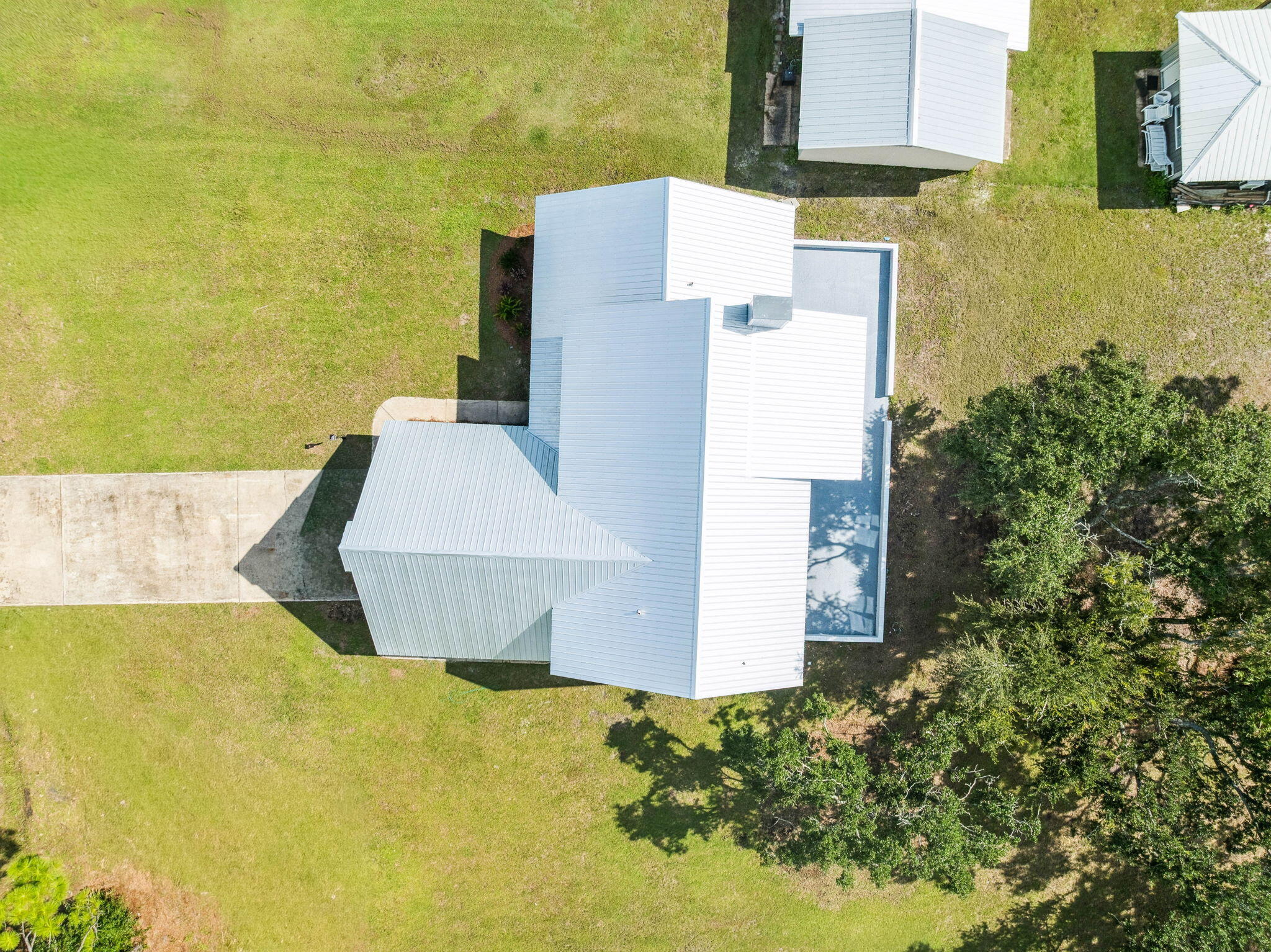2208 Bay Grove Road Freeport, FL 32439 - Photo 62 of 70 a aerial view of a house with a yard and sitting space