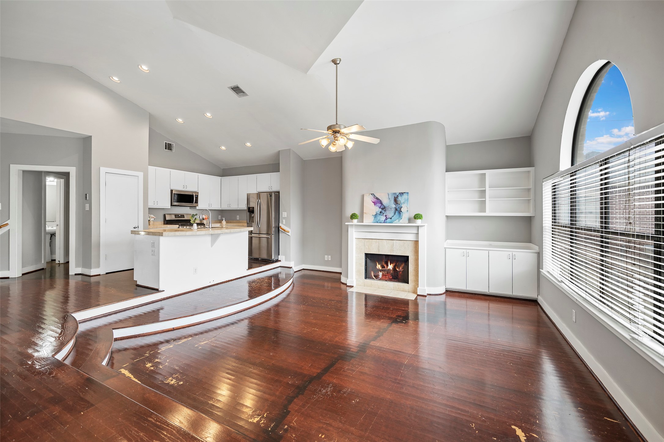 9705 Linkmeadow Lane Houston, TX 77025 - Photo 19 of 32 a kitchen with a refrigerator and a stove top oven