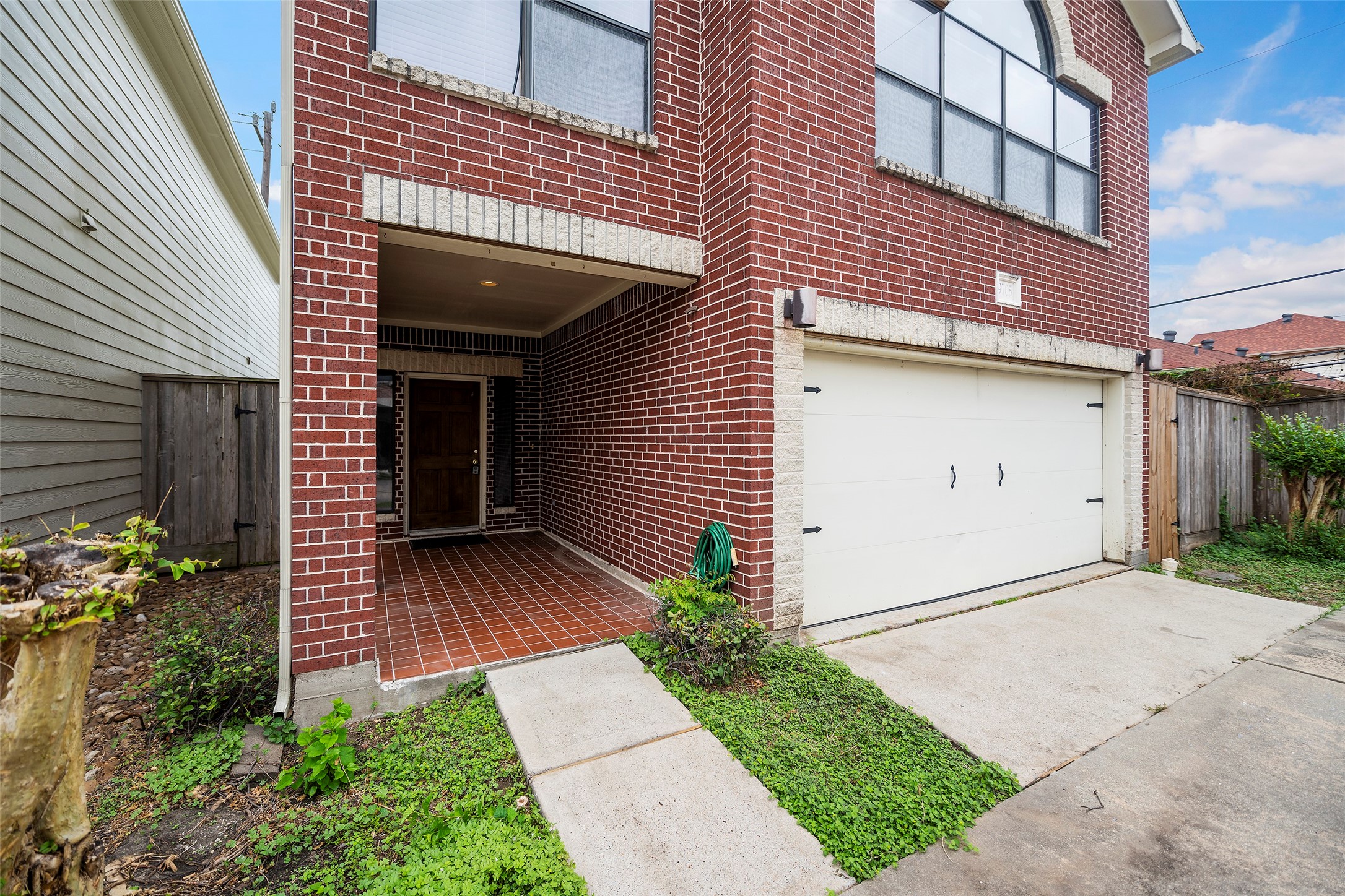 9705 Linkmeadow Lane Houston, TX 77025 - Photo 31 of 32 a view of a house with a yard
