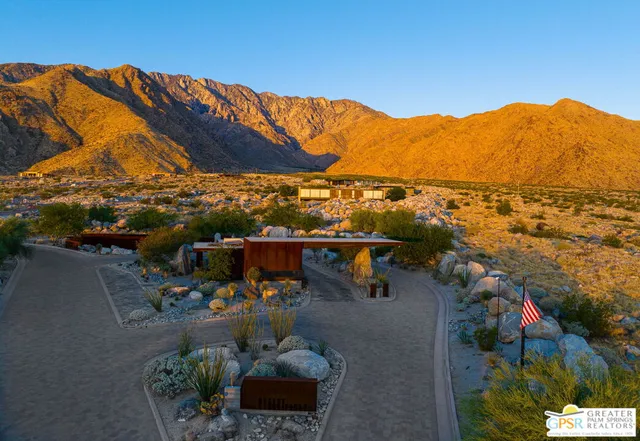 a view of a terrace with couches and wooden floor