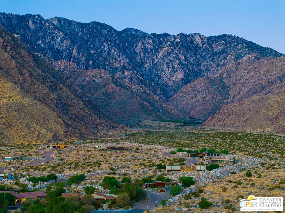 2127 Morning Vista Drive Palm Springs, CA 92262 - Photo 7 of 13 a view of a backyard with wooden fence