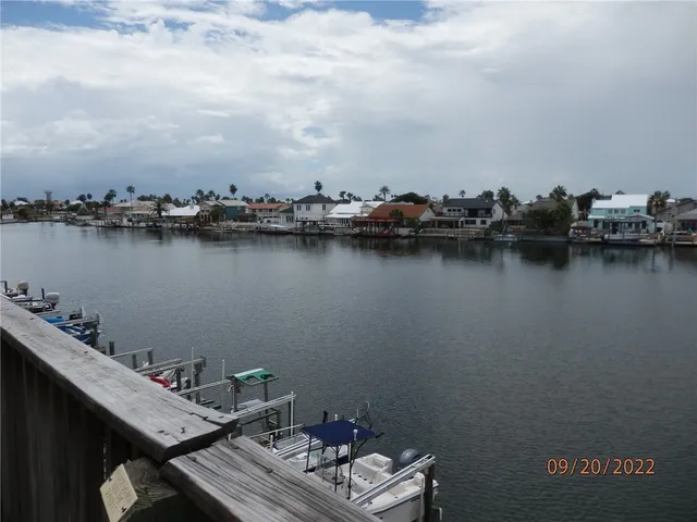 a view of a lake from a balcony