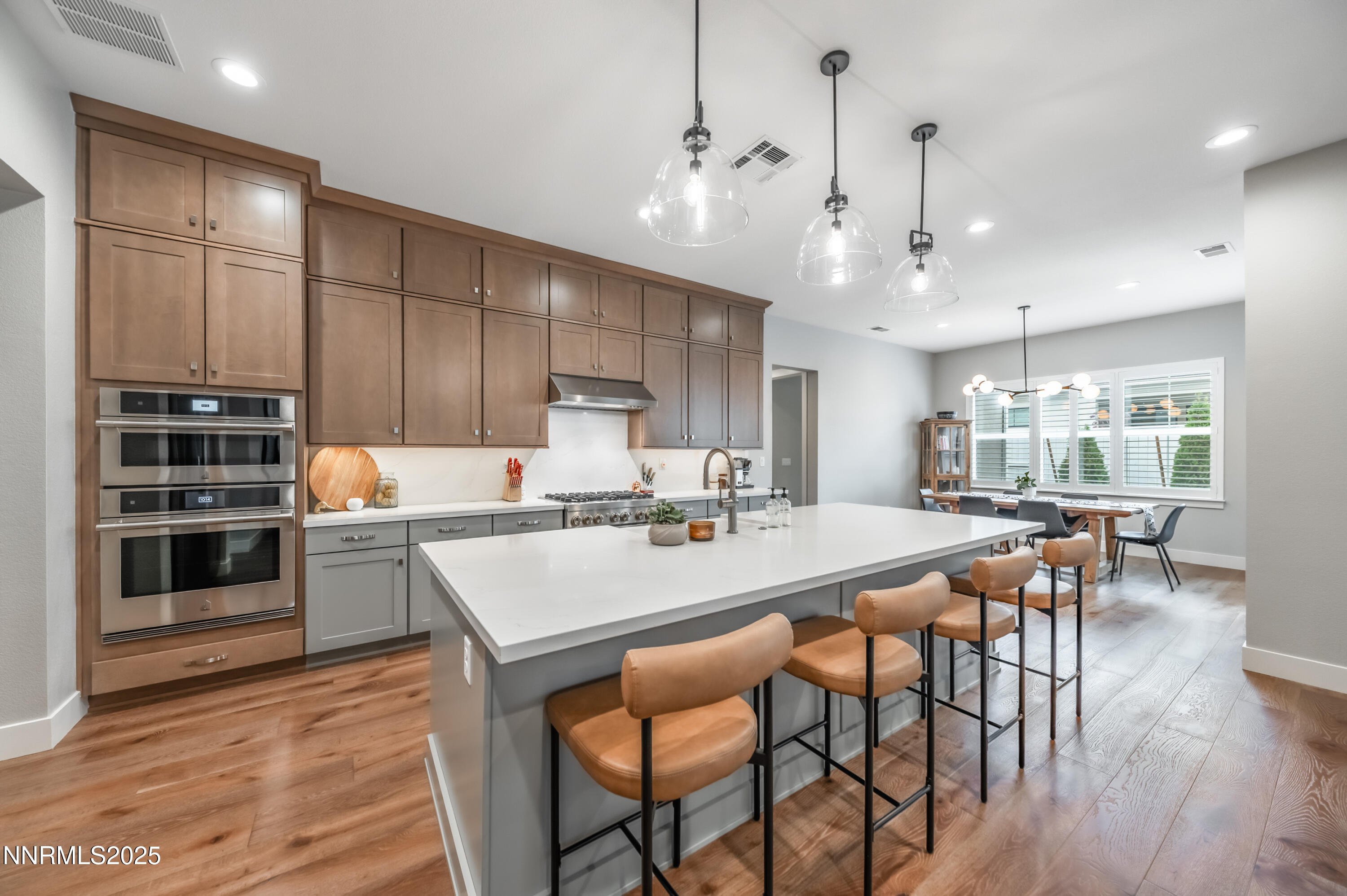 5453 Side Saddle Trail Reno, NV 89511 - Photo 12 of 33 a large kitchen with a table and chairs
