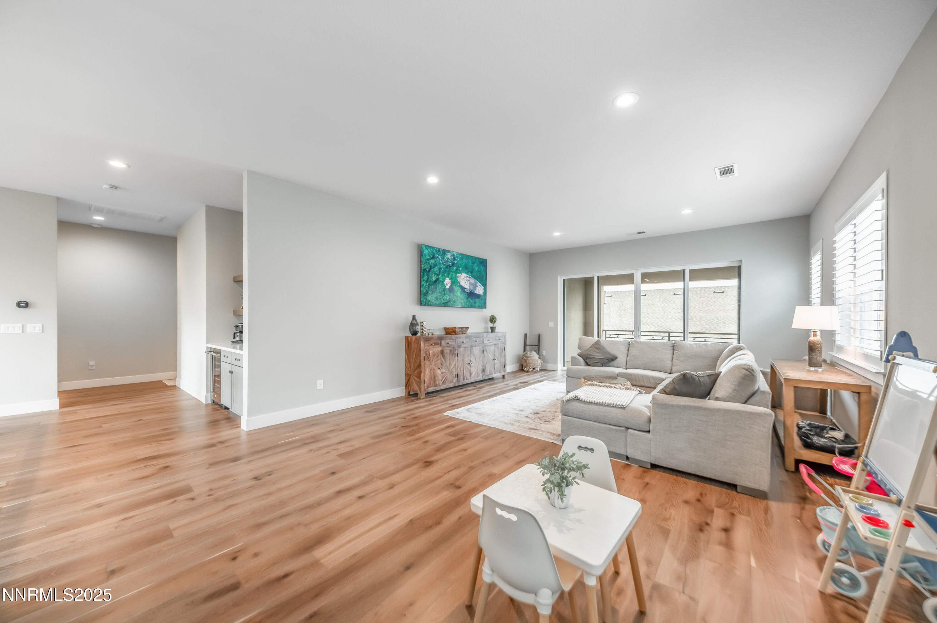 5453 Side Saddle Trail Reno, NV 89511 - Photo 20 of 33 a living room with furniture and a wooden floor