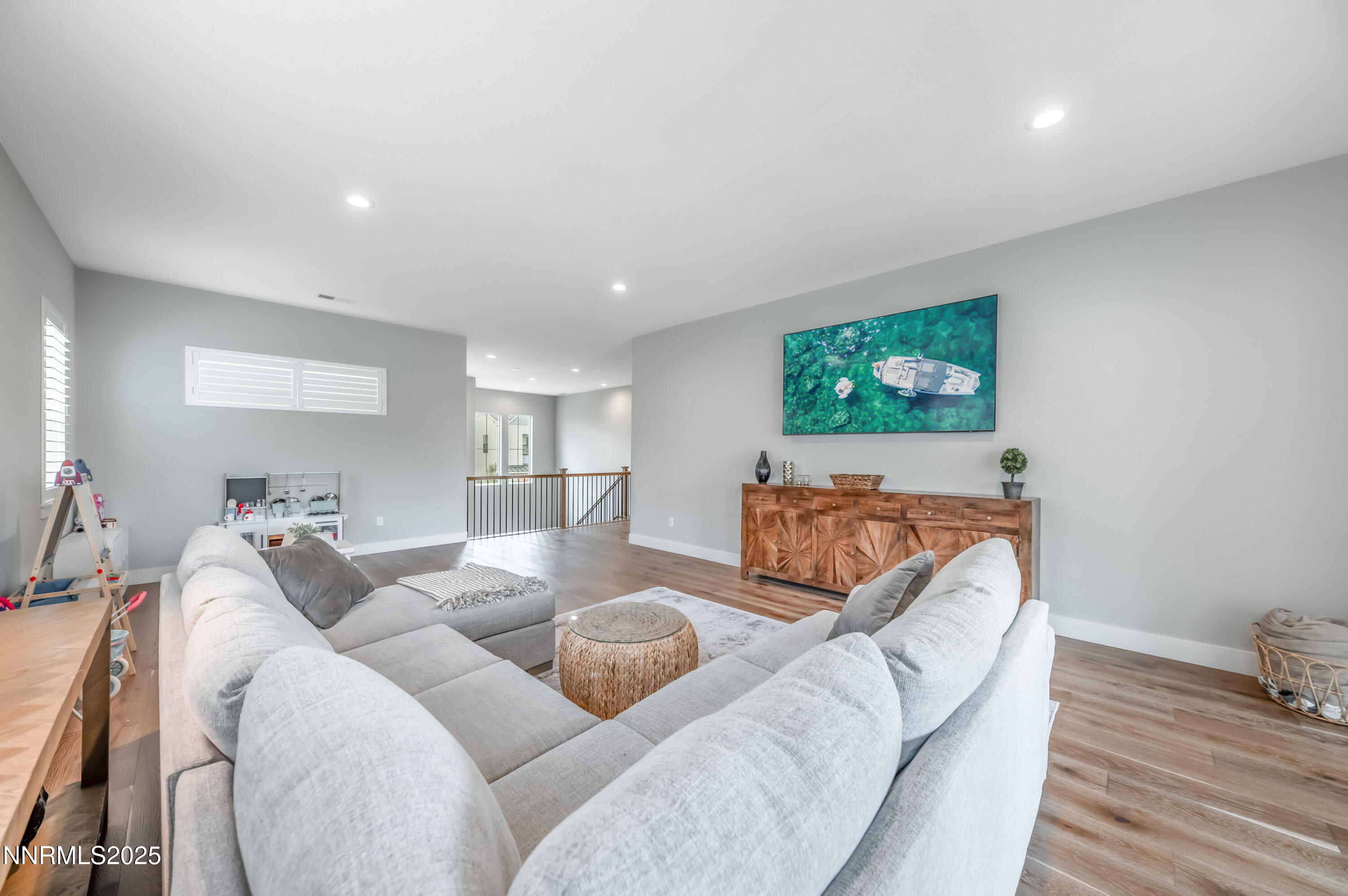 5453 Side Saddle Trail Reno, NV 89511 - Photo 21 of 33 a living room with furniture and a flat screen tv