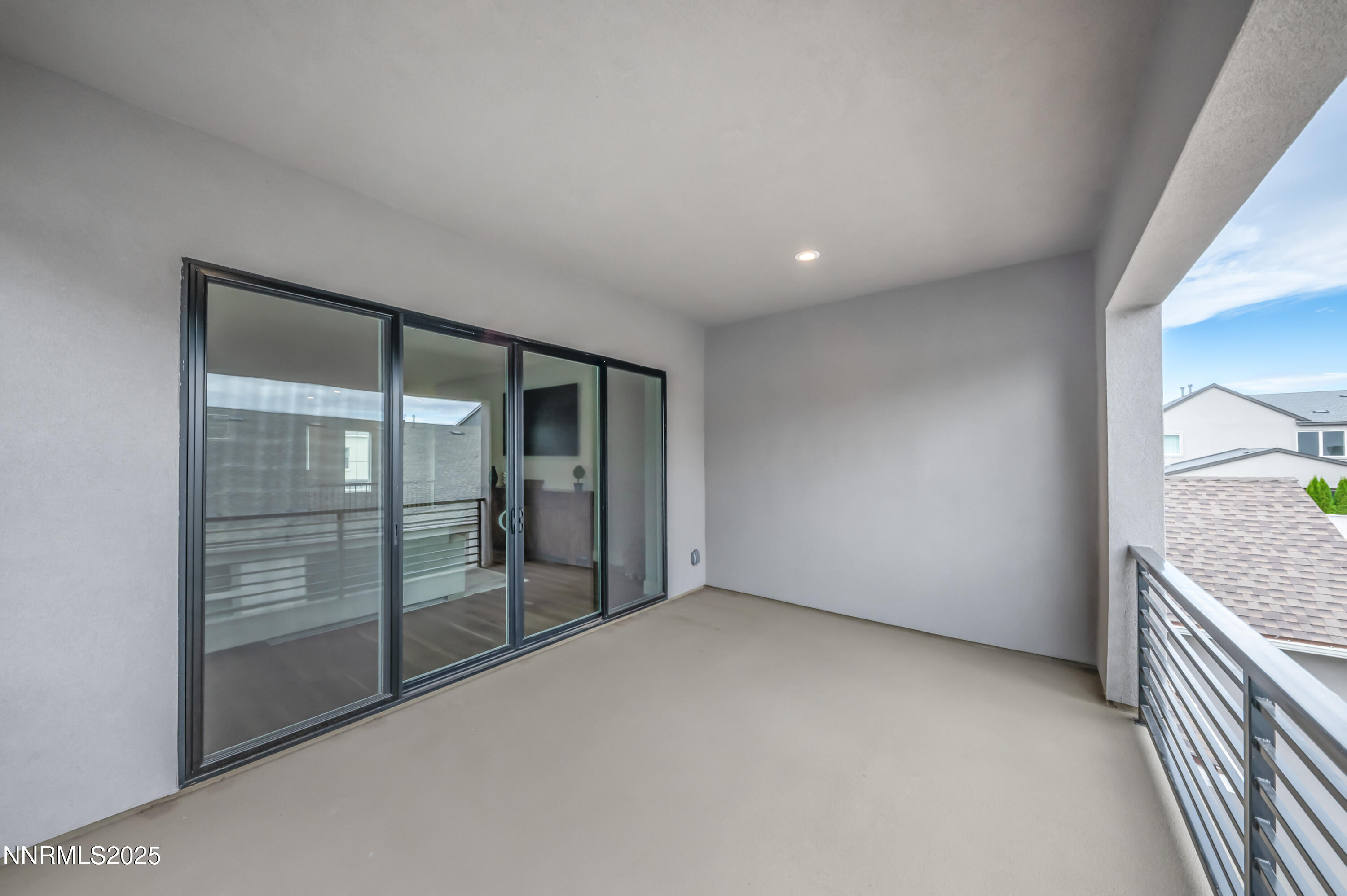 5453 Side Saddle Trail Reno, NV 89511 - Photo 22 of 33 a view of an empty room with wooden floor and a window