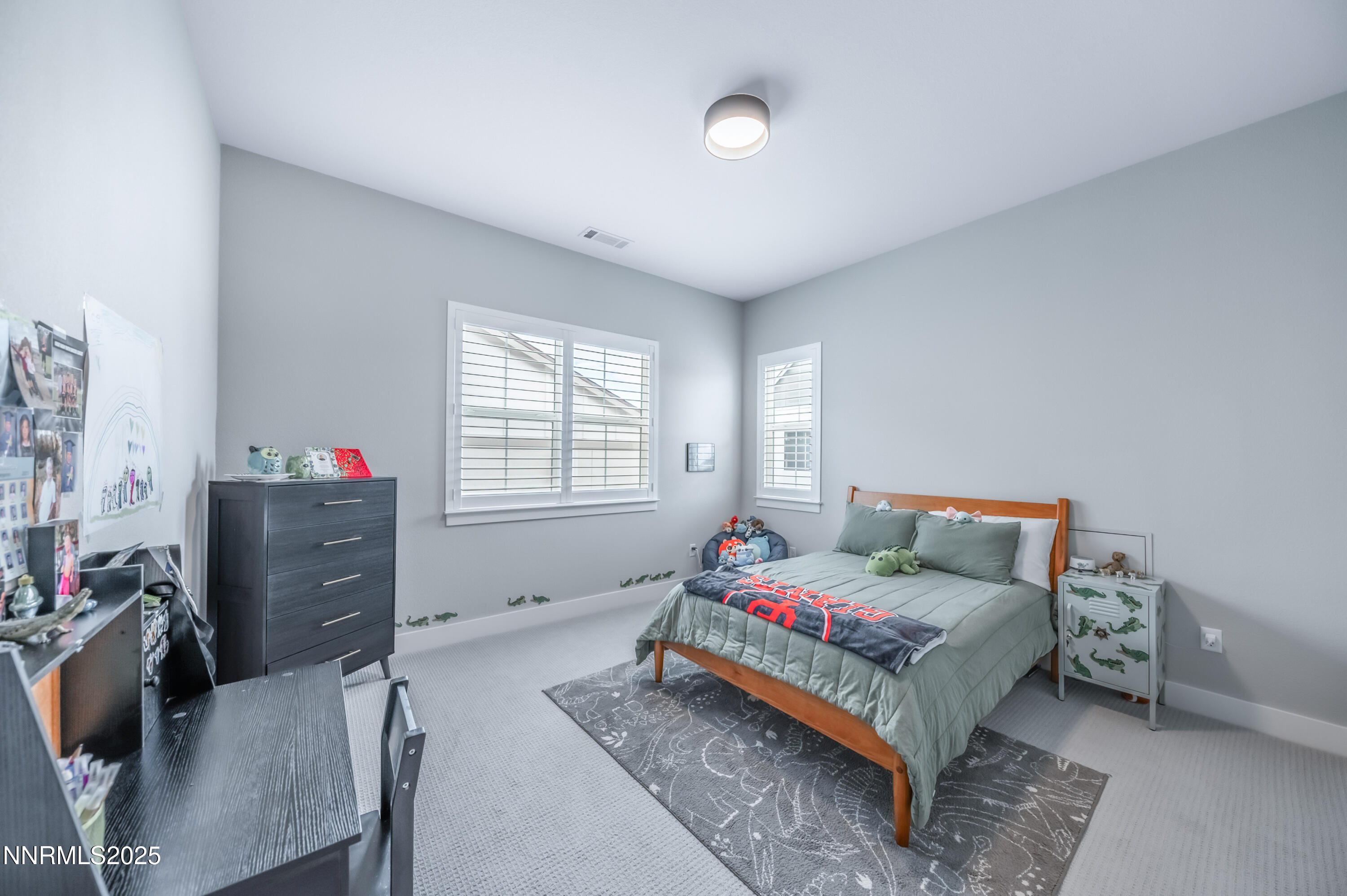 5453 Side Saddle Trail Reno, NV 89511 - Photo 25 of 33 a bedroom with bed and a window