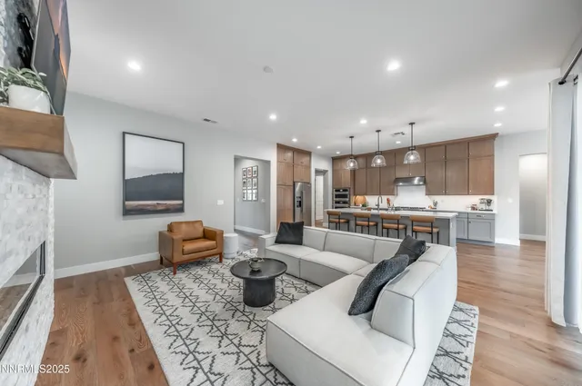 a living room with furniture and a table