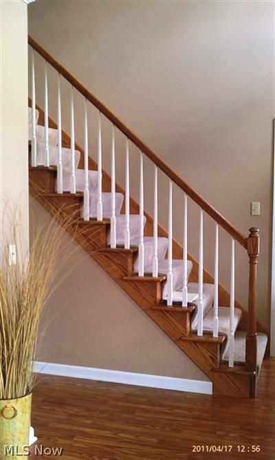 63 Bandy Road North Benton, OH 44449 - Photo 4 of 20 Classic stairs with lovely woodworking lead to the second floor.