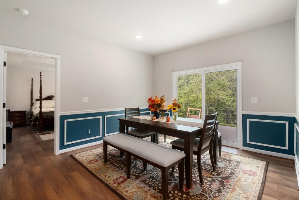 124 Willington Way Newnan, GA 30265 - Photo 12 of 41 a view of a workspace with furniture window and wooden floor