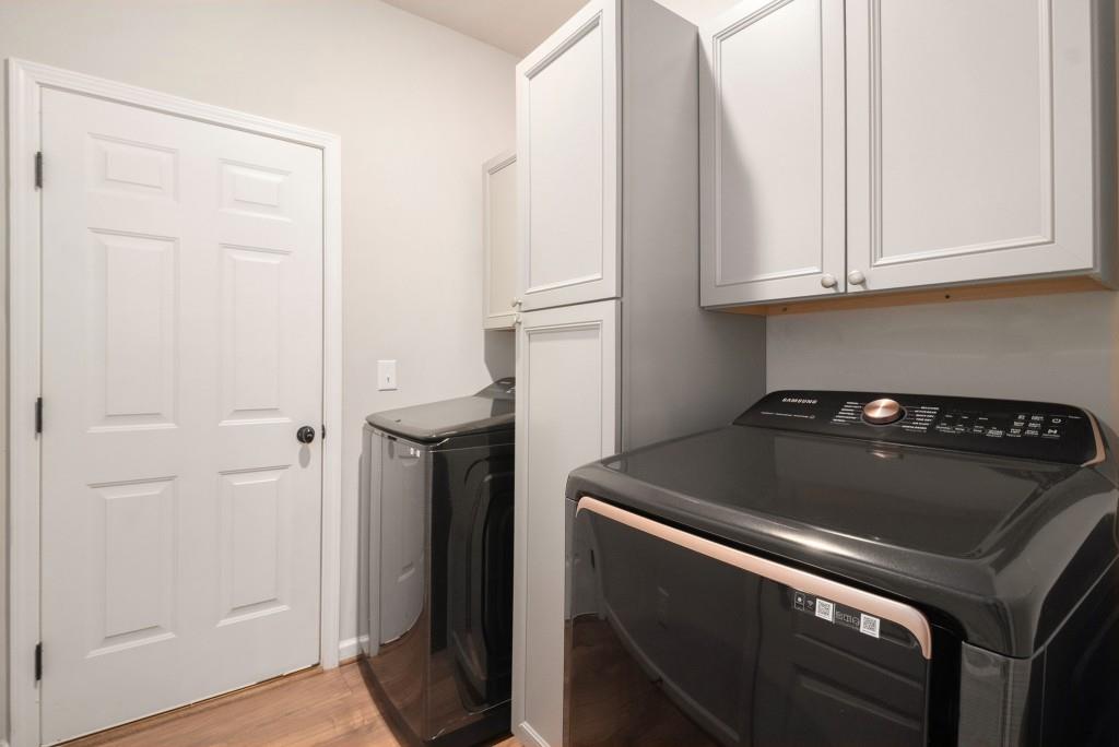 124 Willington Way Newnan, GA 30265 - Photo 24 of 41 a close view of washer and dryer