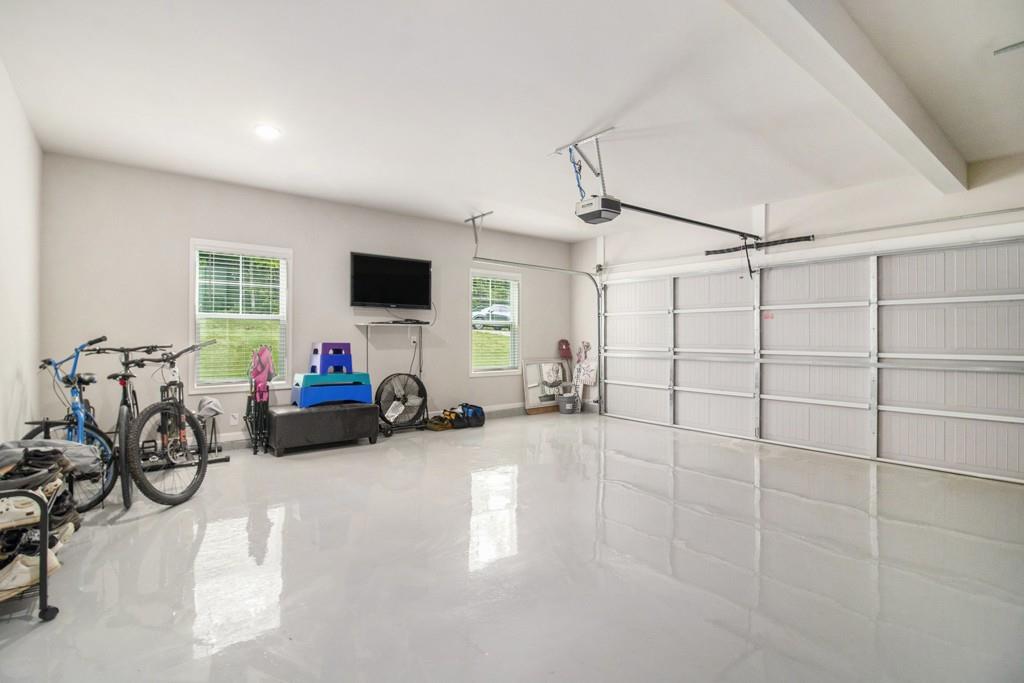 124 Willington Way Newnan, GA 30265 - Photo 25 of 41 a view of a livingroom with furniture and a window