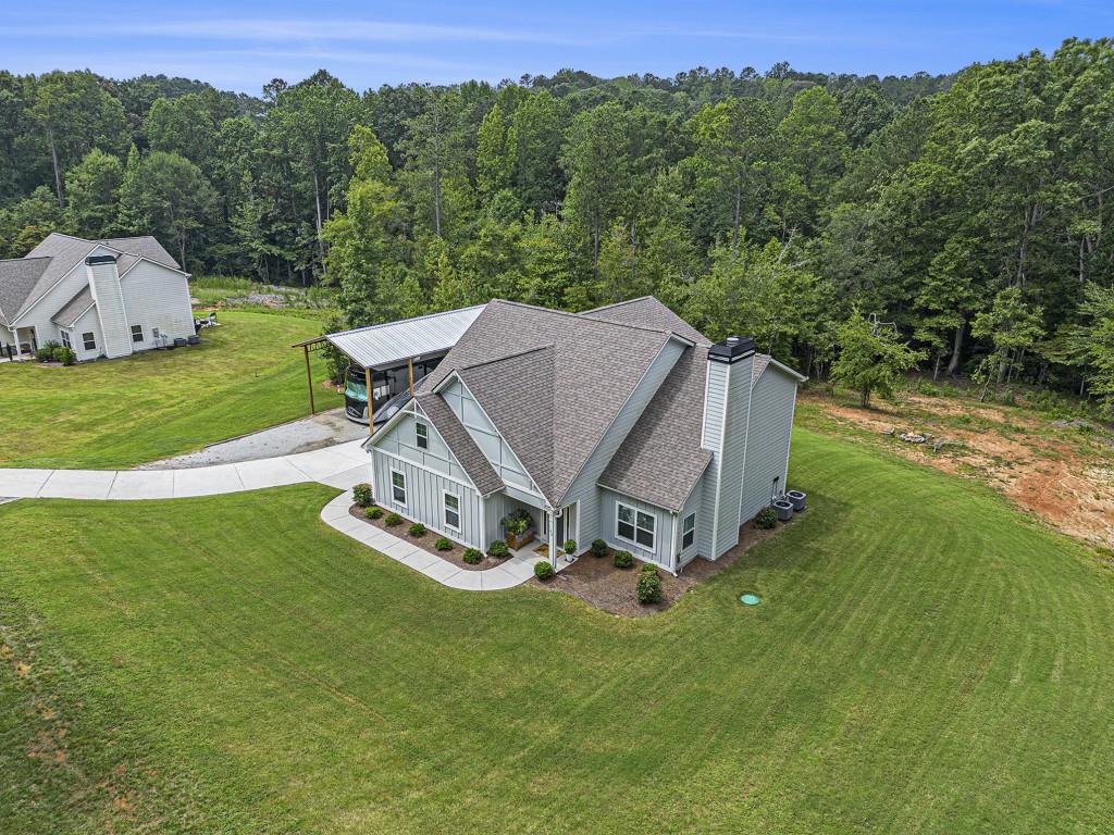 124 Willington Way Newnan, GA 30265 - Photo 32 of 41 a aerial view of a house with a yard