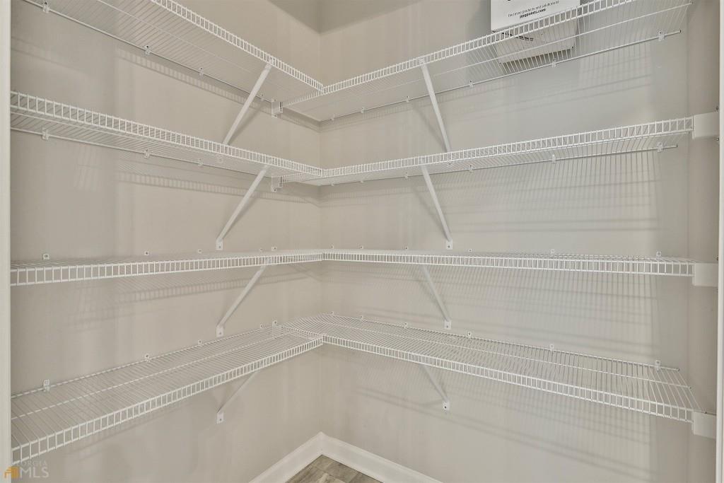 124 Willington Way Newnan, GA 30265 - Photo 8 of 41 a view of a room with shelf on the wall