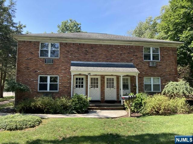 15-1 Spruce Street, Unit 151 Oakland, NJ 07436 - Photo 1 of 13 front view of a house with a yard