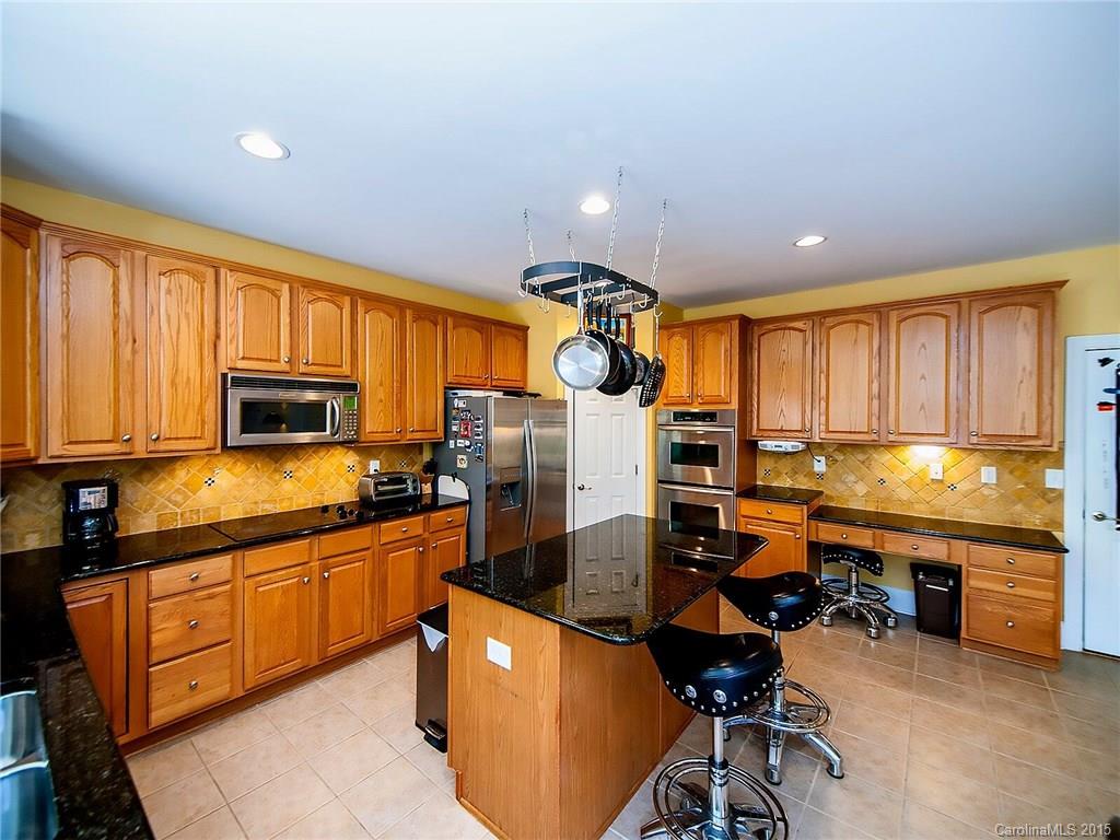 4415 Sunset Rose Drive Fort Mill, SC 29708 - Photo 11 of 24 a kitchen with lots of counter top space