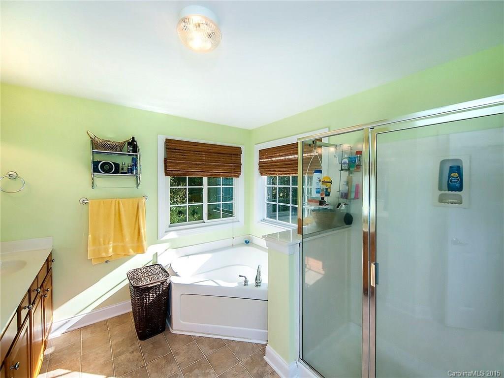 4415 Sunset Rose Drive Fort Mill, SC 29708 - Photo 15 of 24 a bath tub sitting in a bathroom next to a window