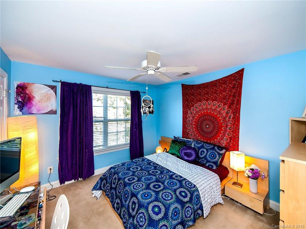 4415 Sunset Rose Drive Fort Mill, SC 29708 - Photo 18 of 24 a bedroom with a bed and window