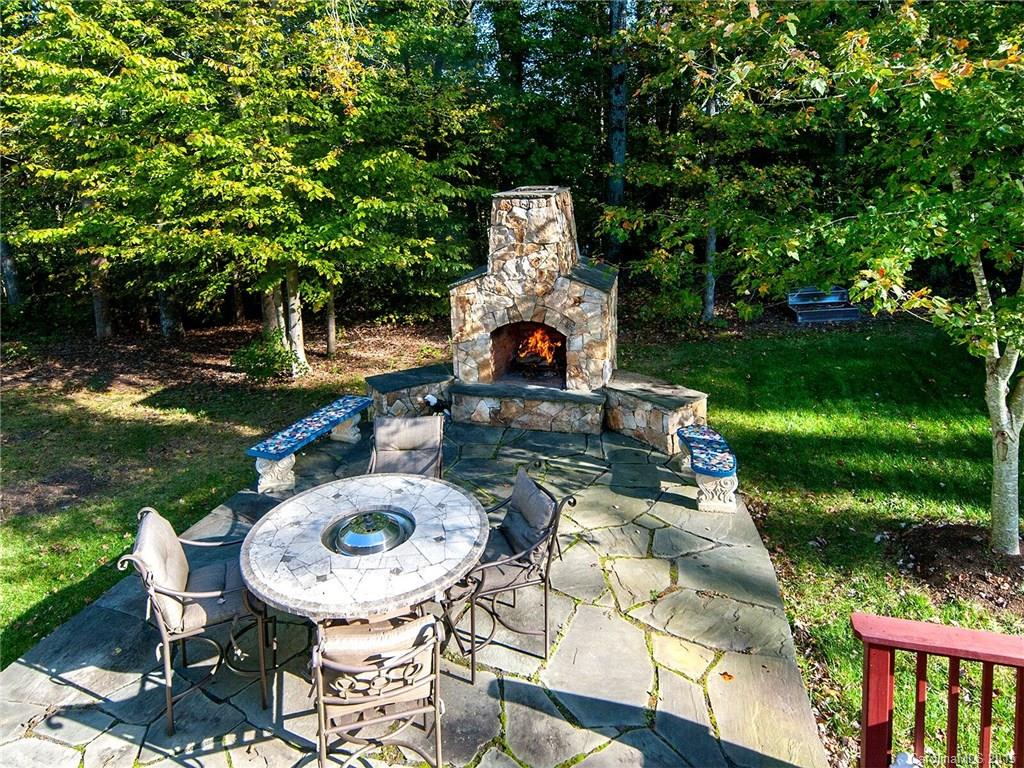 4415 Sunset Rose Drive Fort Mill, SC 29708 - Photo 23 of 24 a view of a chairs and table in backyard of the house