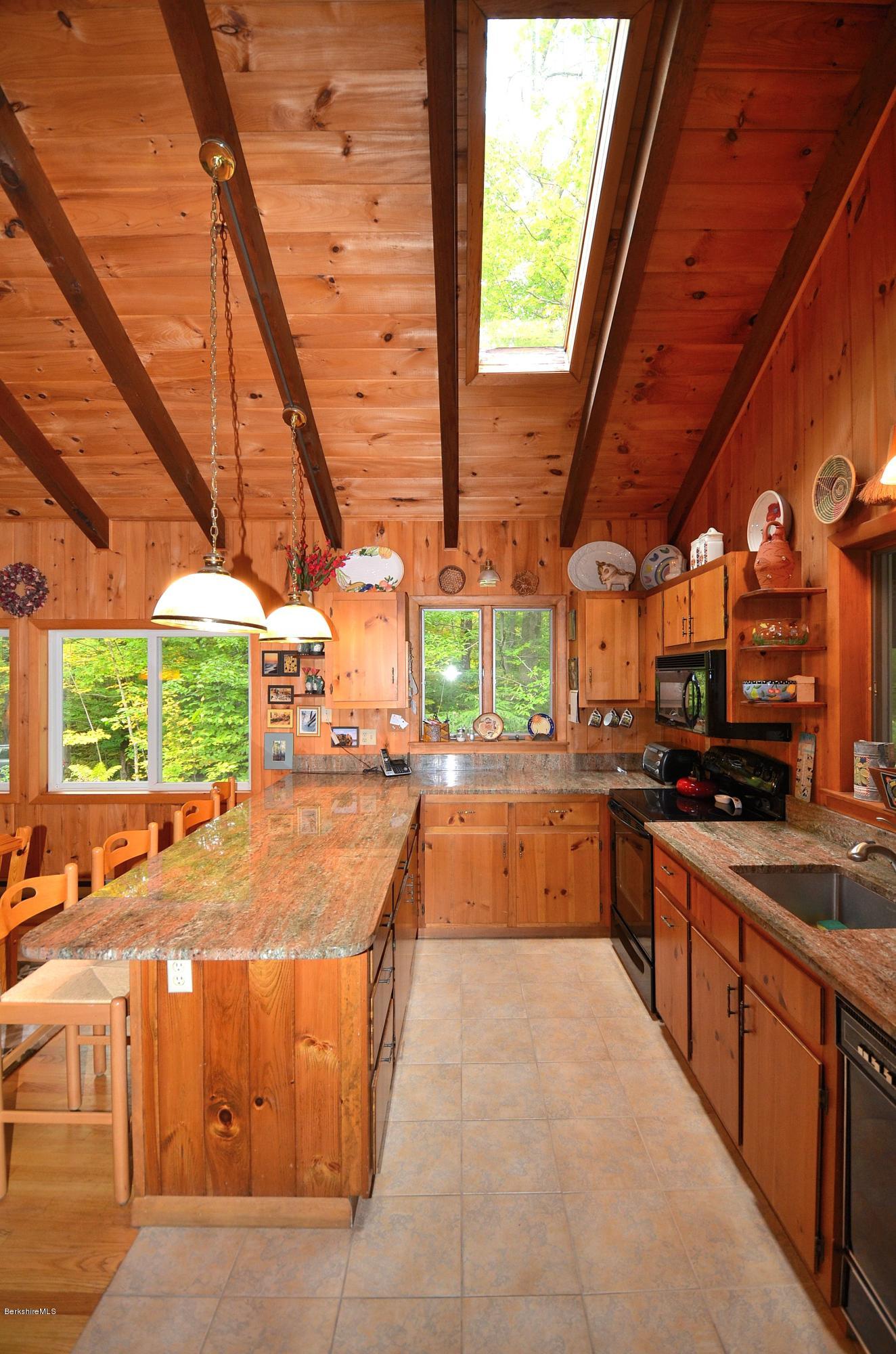19 Cherokee Road Becket, MA 01223 - Photo 12 of 22 a large kitchen with lots of counter top space