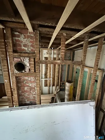 a bed room with a bed and a window