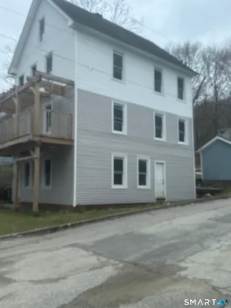a front view of a house with a garage