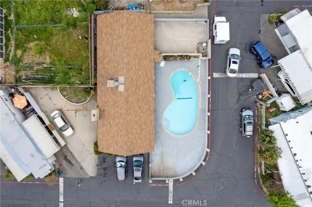 an aerial view of a highlighted house