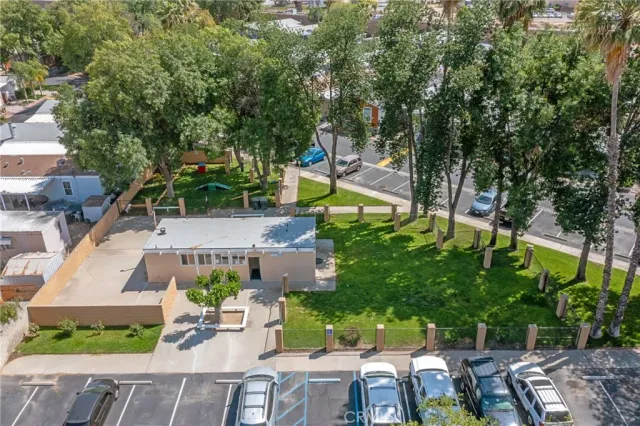 an aerial view of a house with a swimming pool