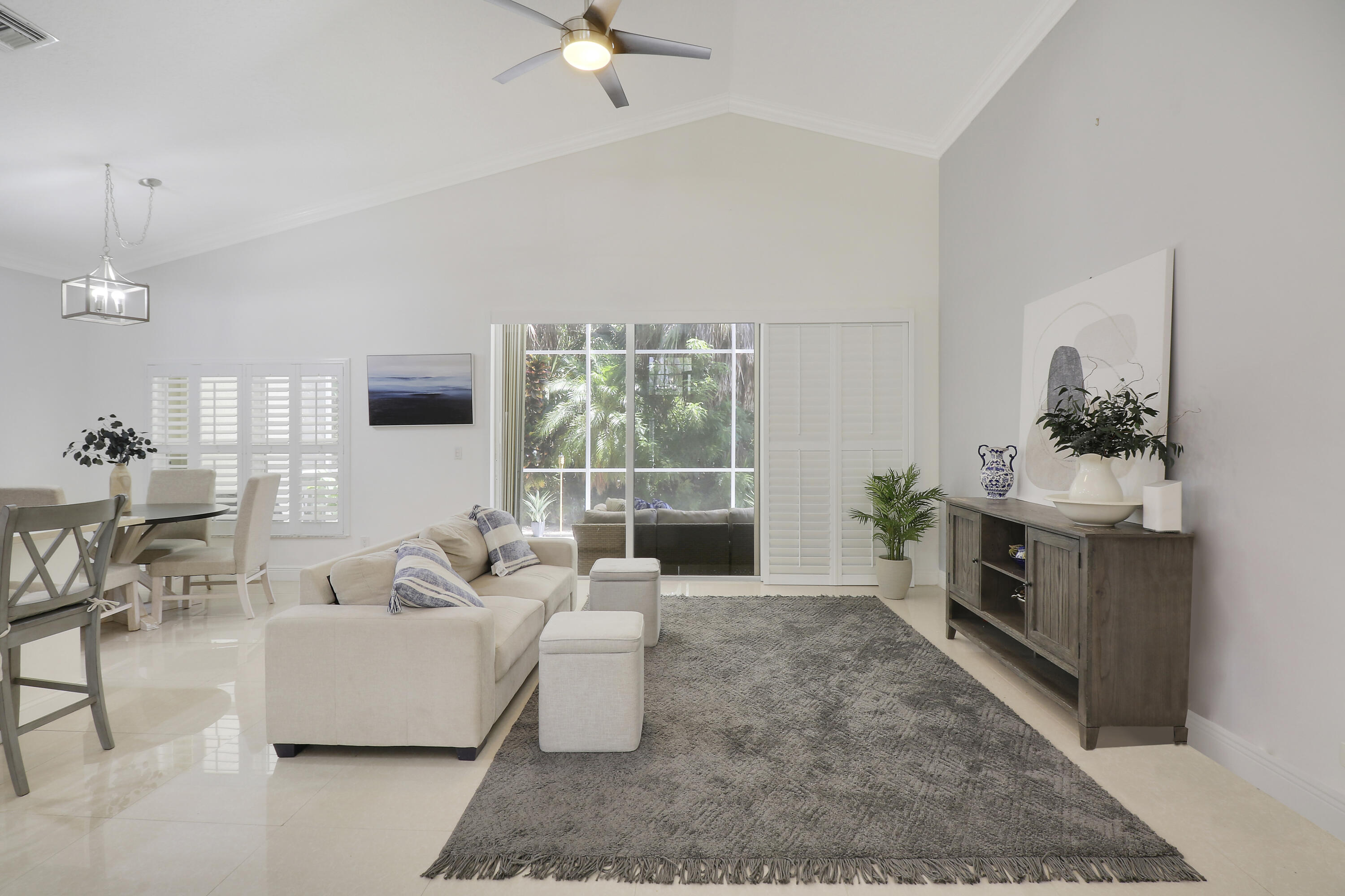 211 Pennock Trace Drive Jupiter, FL 33458 - Photo 15 of 39 a living room with furniture and a fireplace