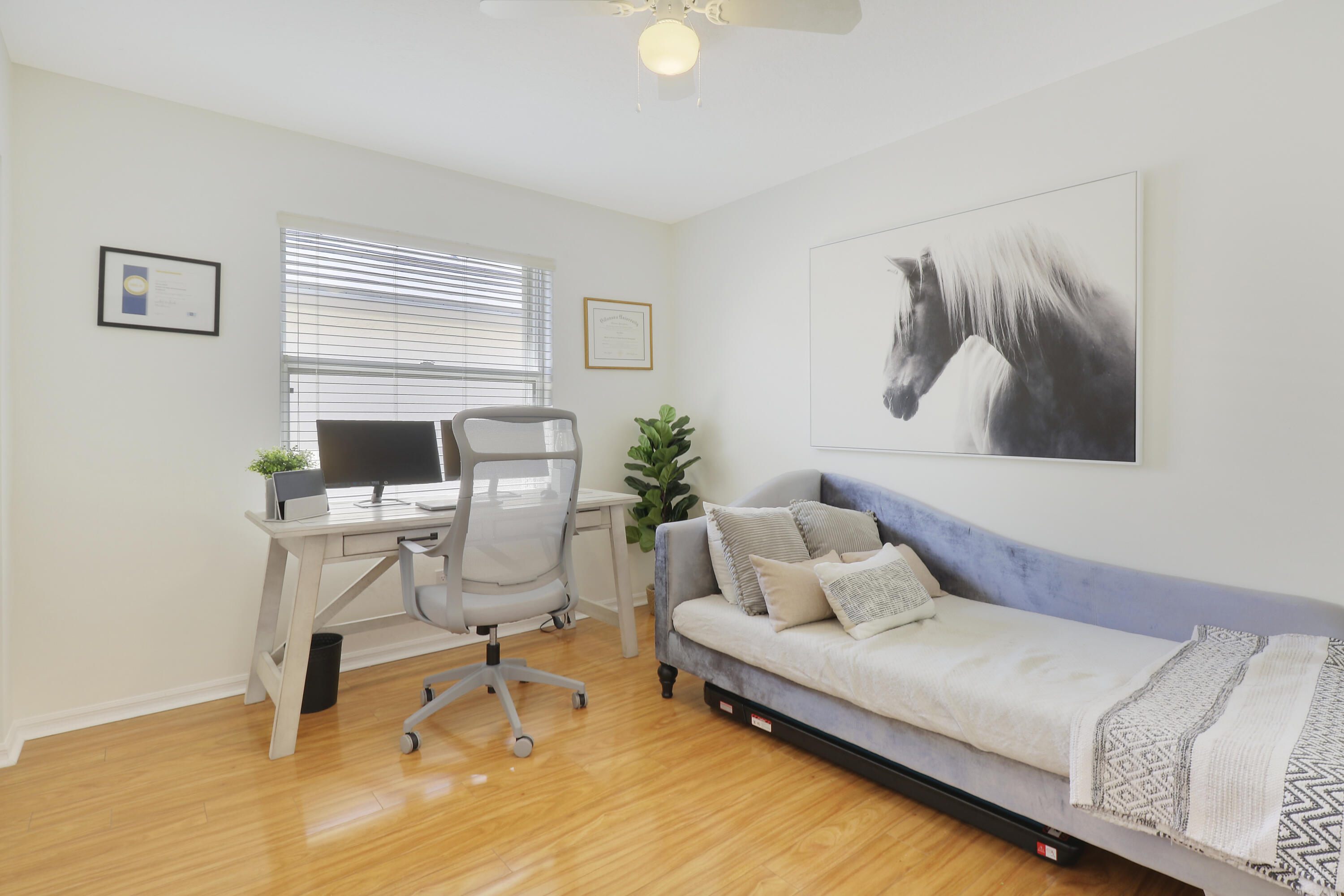 211 Pennock Trace Drive Jupiter, FL 33458 - Photo 32 of 39 a bedroom with a bed and a chair