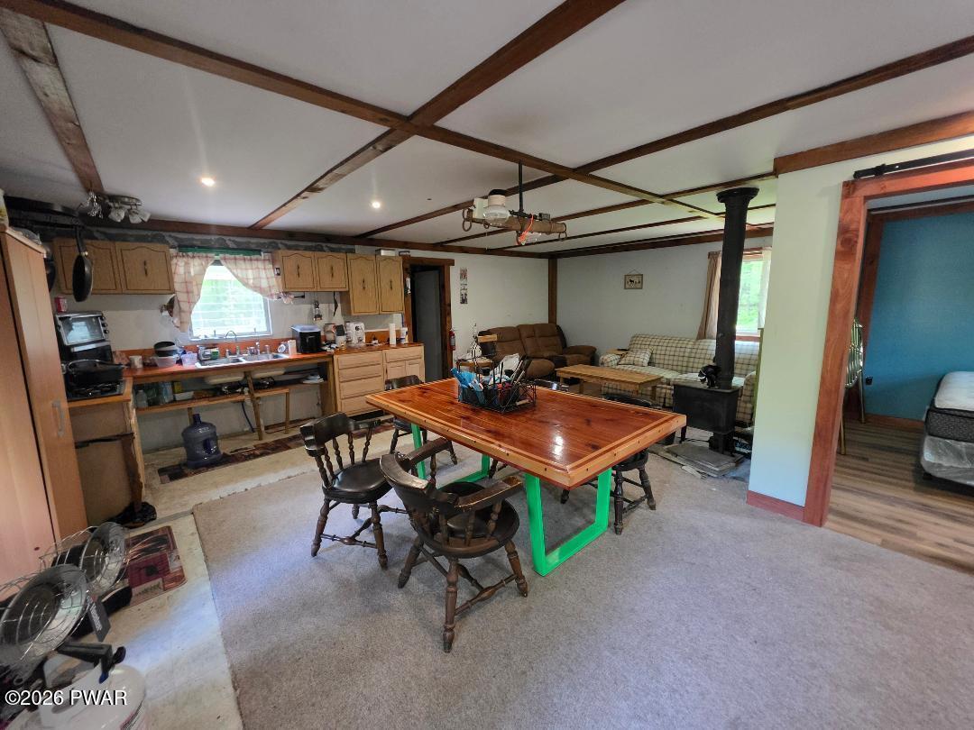 94 Swamp Road Pleasant Mount, PA 18453 - Photo 8 of 33 a outdoor space with furniture and a window