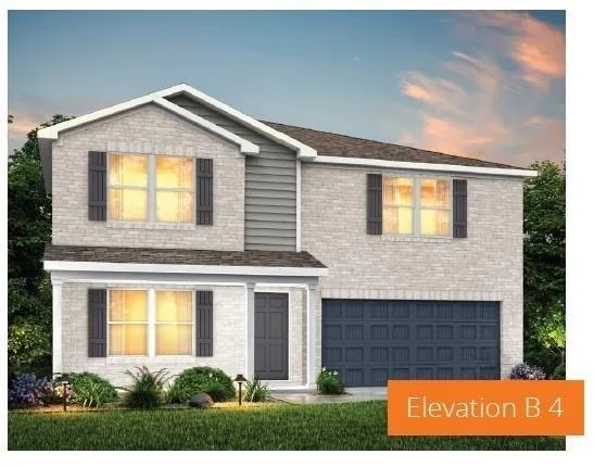 a view of a house with a small yard and wooden floor