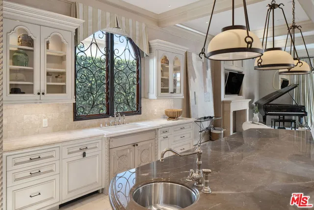 a bedroom with a balcony a bed and a couch