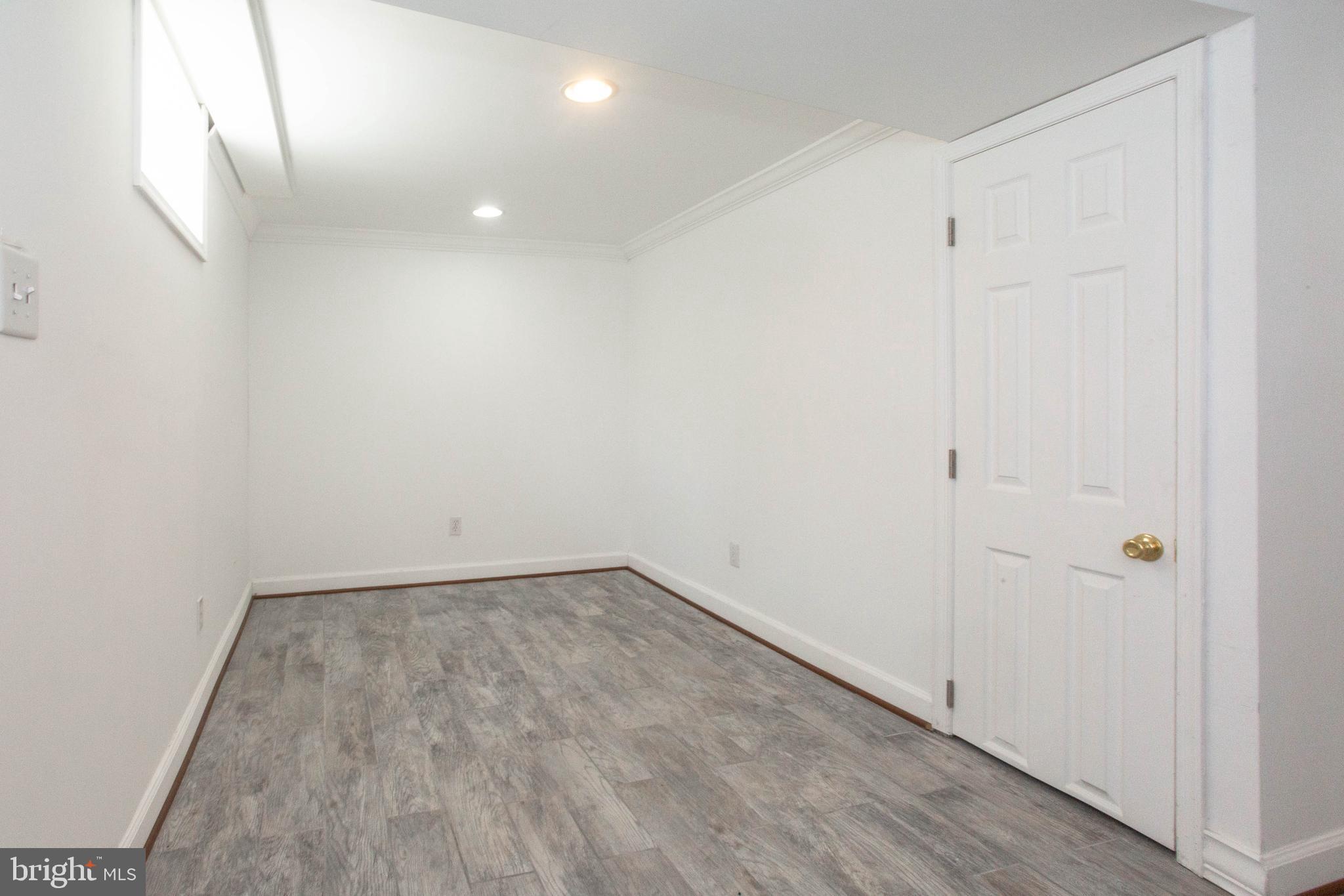 1327 Limit Avenue Baltimore, MD 21239 - Photo 6 of 24 a view of an empty room