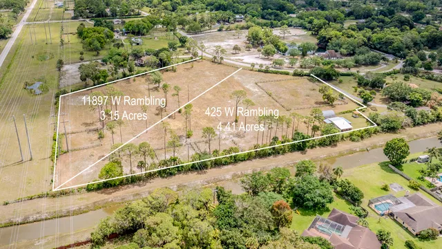 a view of a lake with a yard