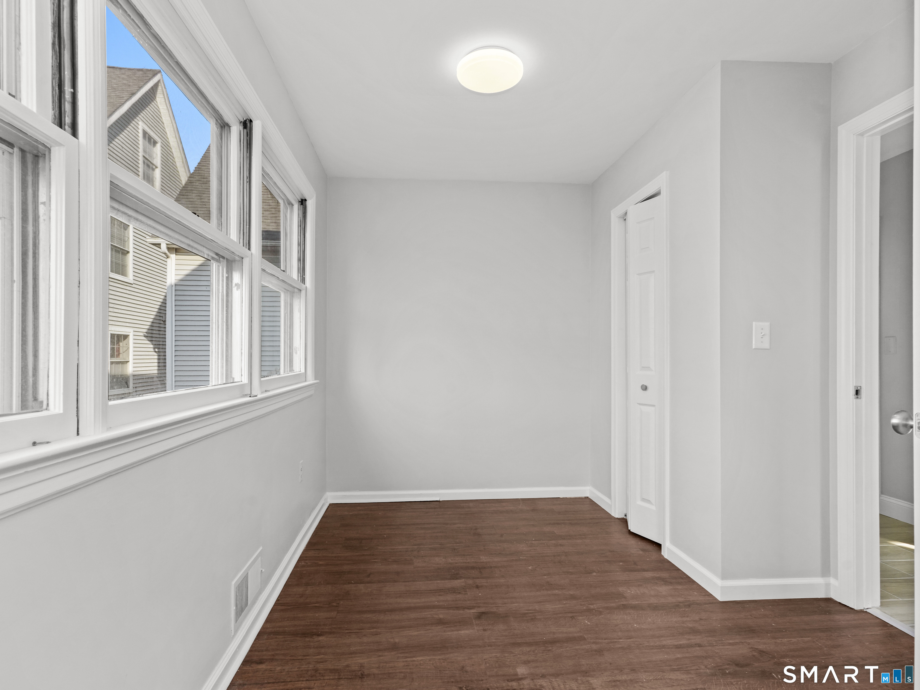 20 Cerretta Street Stamford, CT 06907 - Photo 17 of 22 a view of an entryway with wooden floor