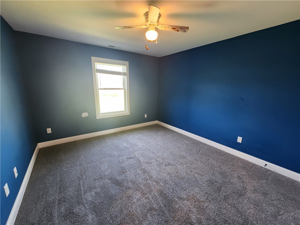 7441 Dodson Road Brookville, OH 45309 - Photo 33 of 50 This spacious room features ample natural light and plush carpeting, ready for personalization.