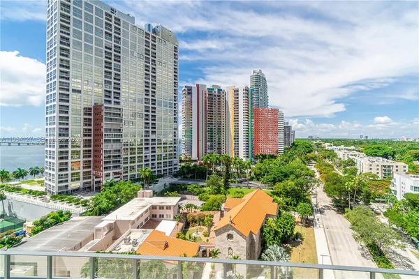 a view of a city with tall buildings